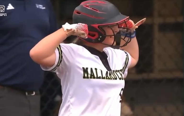 Everlee Junker flexing after hitting a two-run RBI single to take the lead in the Southeast Regionals against Georgia